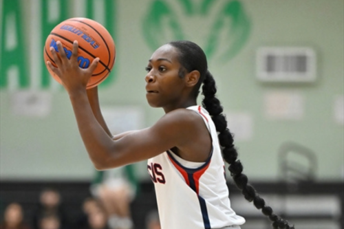 Danielle Ruff of Vacaville Christian High School prepares to shoot during a varsity basketball game. Ruff, a Class of 2026 graduate, will continue her basketball career at Solano College.