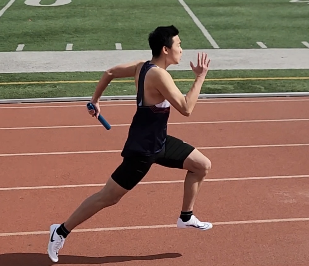 Senior, Eason, running track.