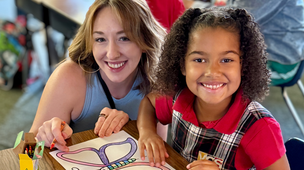 Mom and daughter 1st day of school photo.